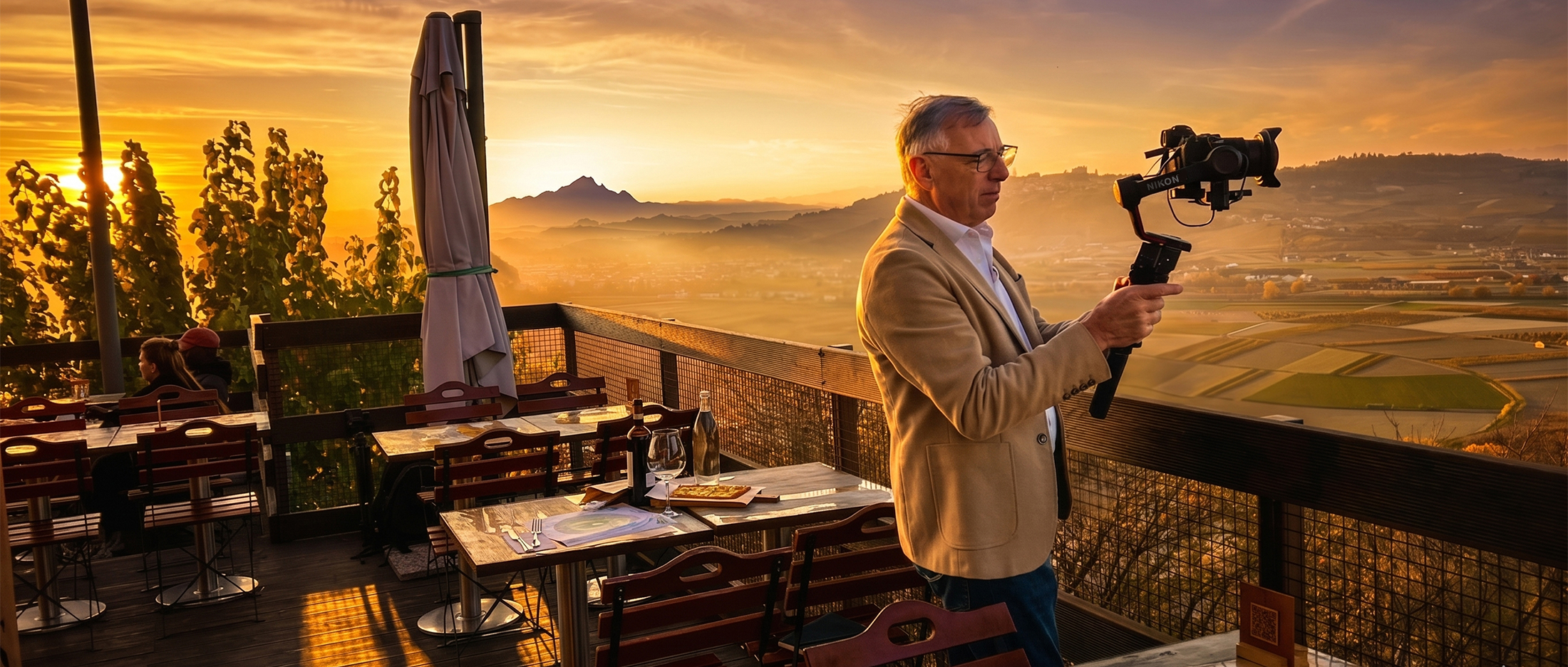Richard A. Edwards filming at sunset over the Langhe vineyards in Piedmont, Italy