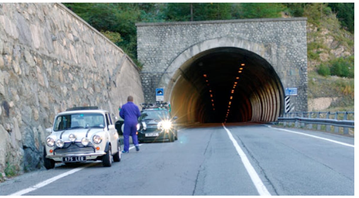 A classic Mini outside the mountain tunnel near La Thuile where the Lamborghini Miura crashed in The Italian Job